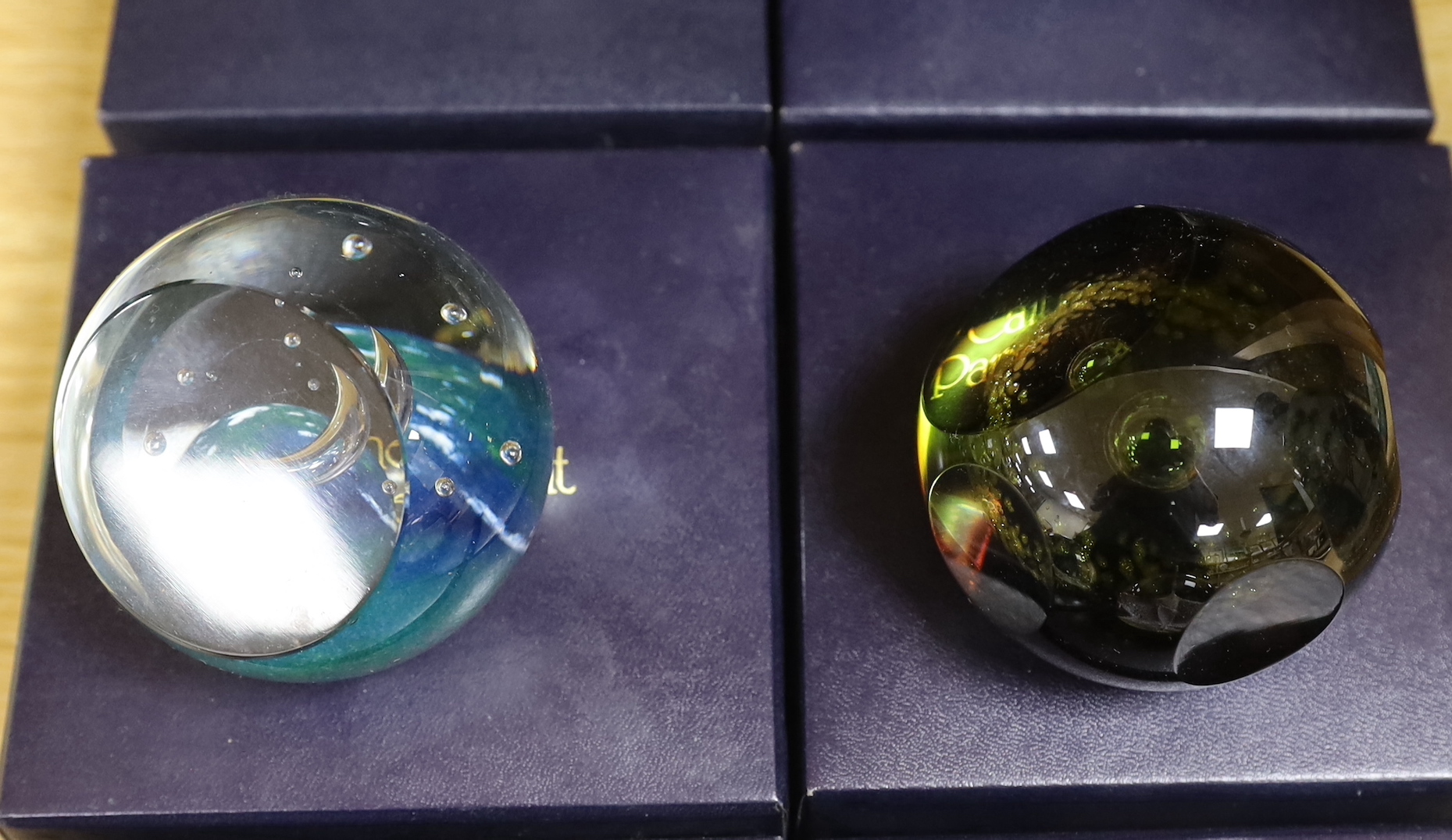 Ten Caithness paperweights including Viking Flame, limited edition 216/750 and Eterna, 175/500, each with boxes, the largest 7.5cm high